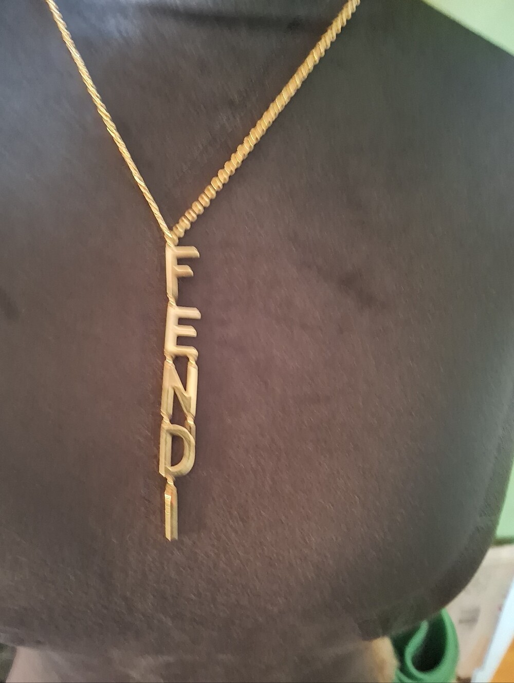 Fendi Vertical Logo Drop Necklace in Gold Tone